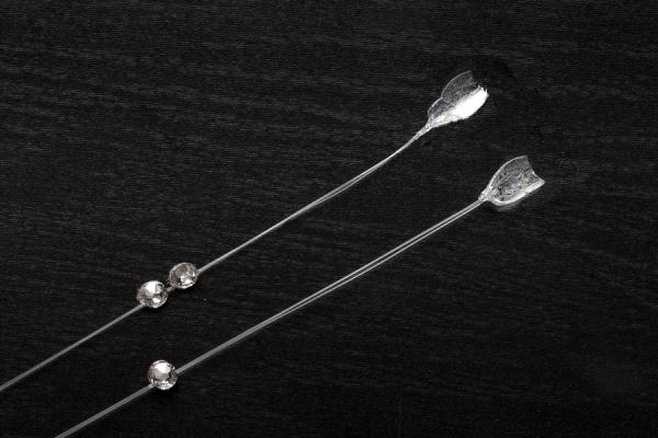 Crystal-Extensions on transparent thread